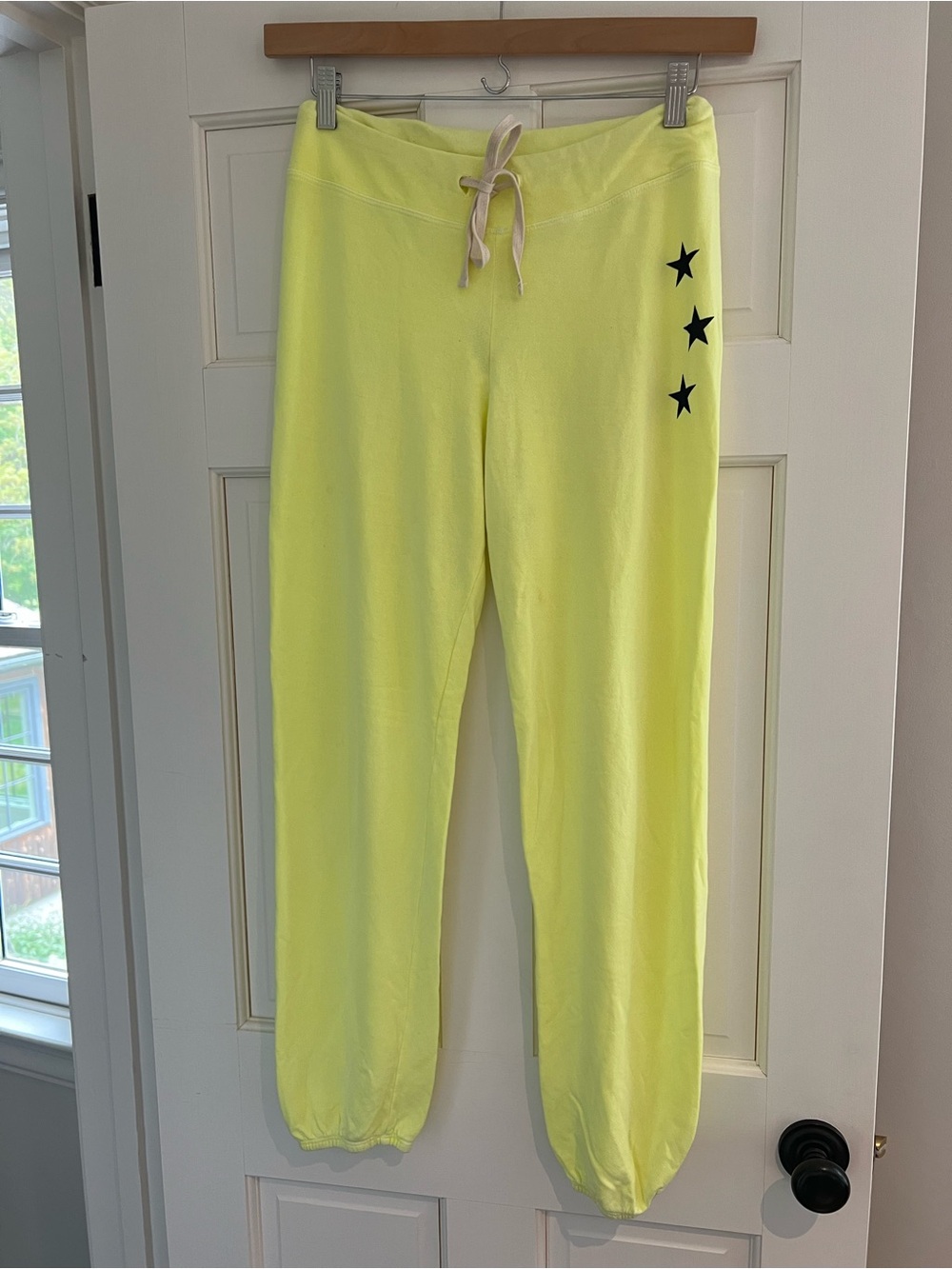 Sundry Neon Yellow Sweatpants with Black Star Accents